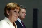 Порошенко пожаловался Меркель на невыполнение договоренностей боевиками 