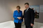 Порошенко сегодня обсудит с Меркель ситуацию на Донбассе и выполнение Минских соглашений