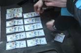 Появилось видео задержания посредника с крупной взяткой в Николаевском горсовете