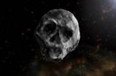 К Земле приближается огромный черный астероид в форме черепа
