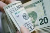 НБУ опустил официальный курс гривни к доллару сильнее, чем раньше