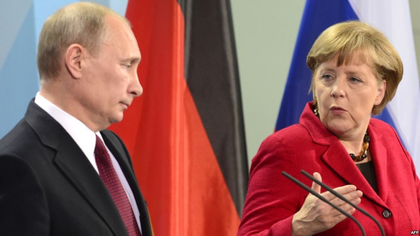 Меркель призвала Россию перекрыть поток оружия через границу с Украиной