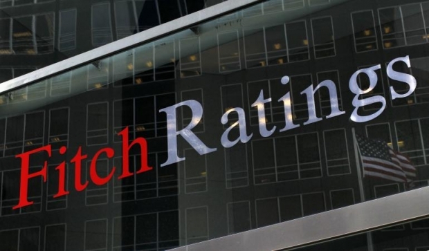 Украина избежала дефолта, — Fitch