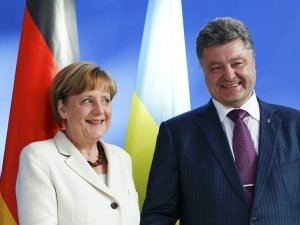 Порошенко и Меркель обсудят сегодня "Минск" 