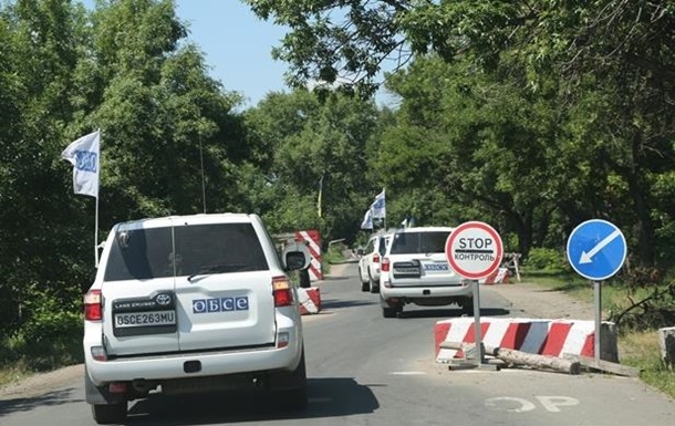ОБСЕ: В Луганске грузовики с военной техникой