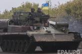 СНБО: Украина начнет выводить тяжелую технику из зоны АТО только после того, как боевики прекратят обстрелы на 24 часа