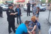 В Бердянске на марше "Азова" избили недовольного прохожего
