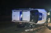 В Харькове перевернулся полицейский автомобиль: двое пострадавших