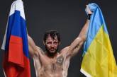 Украинский боец сделал фото с флагами России и Украины после победы