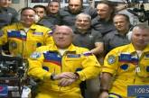 Российские космонавты прибыли на МКС в желто-синем (ВИДЕО)