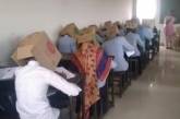 Ученики колледжа писали экзамен по химии с коробками на голове. ФОТО