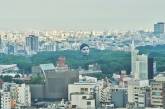Снимок дня. Гигантская летающая голова в Токио, которая следит за пандемией (ФОТО)