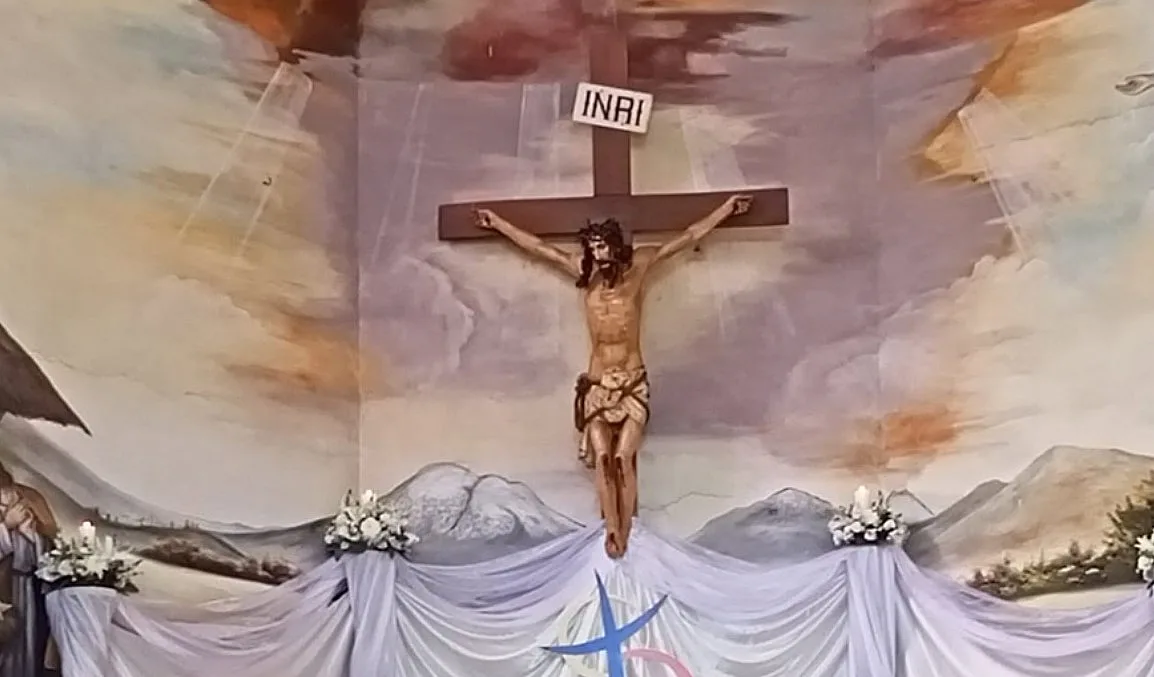 священник