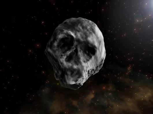 К Земле приближается огромный черный астероид в форме черепа