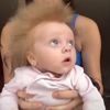 Новорожденная девочка может похвастаться волосами, торчащими в разные стороны (ВИДЕО)