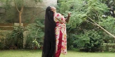 Жінка з найдовшим у світі волоссям: який вона має вигляд та як доглядає за пасмами (фото, відео)