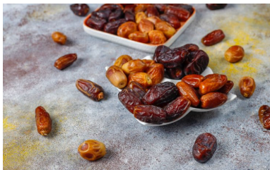 Багато вуглеводів, мало калорій: все про користь та шкоду фініків