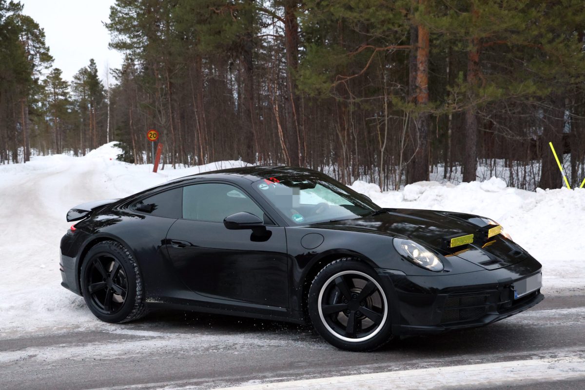 Porsche готує друге покоління 911 Dakar: шпигунські фото гібридного спорткара - фото 8