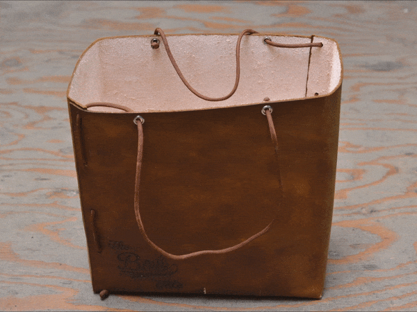 Фотоотчет создания подарочной сумки из кожи