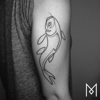 Художник создает удивительные татуировки одной непрерывной линией. Фото