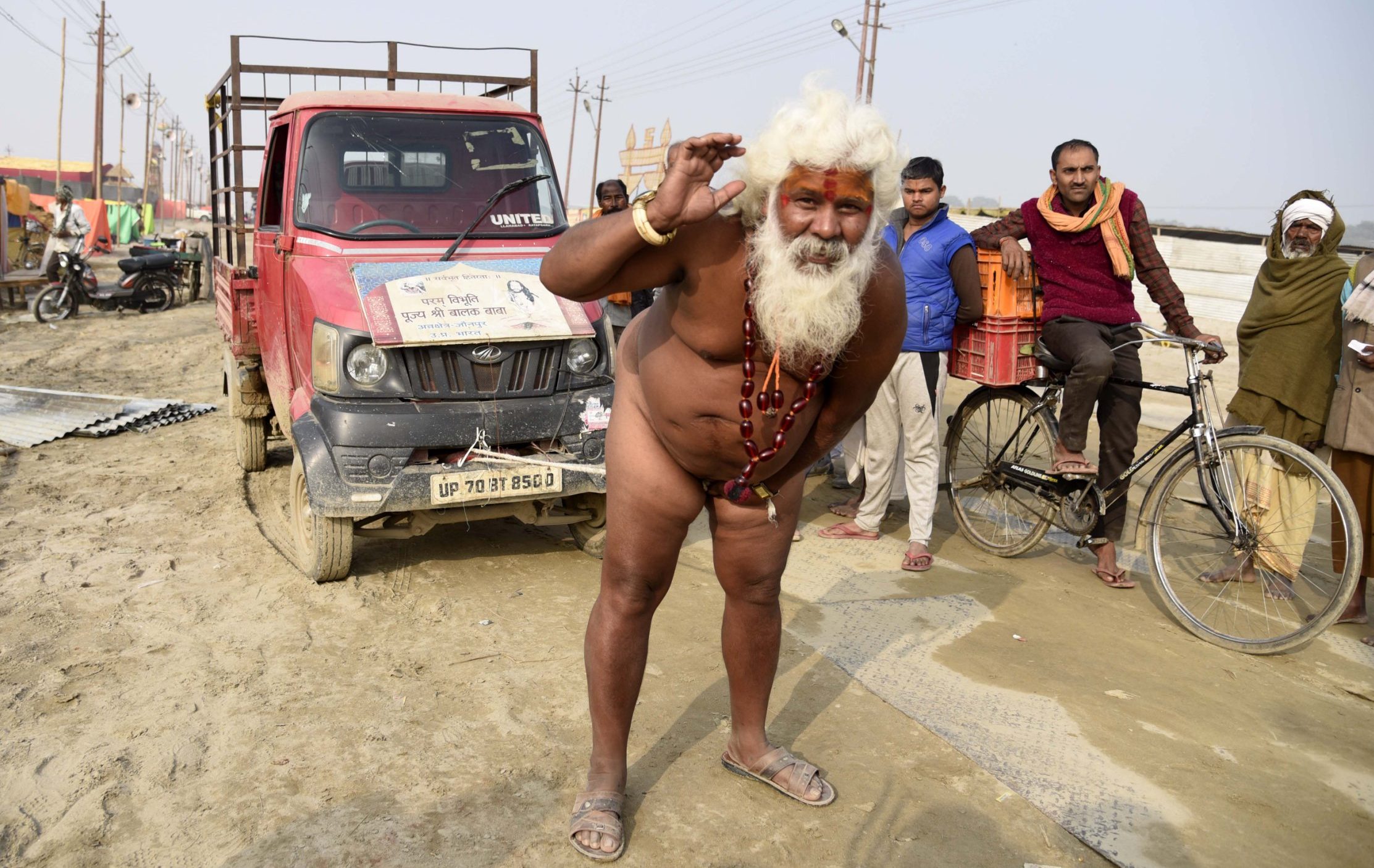 Hindu monk pulls entire van with his penis as part of holy festival