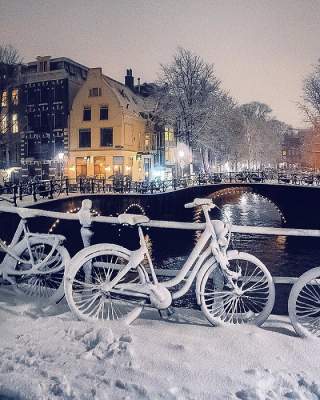 Заснеженный Амстердам в ярких снимках. Фото