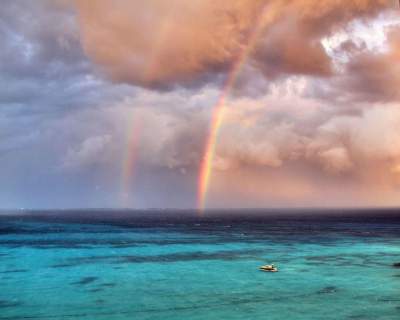 Волшебное зрелище двойной радуги. Фото