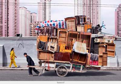 Фотограф показал, как живется мелким предпринимателям в Китае. Фото