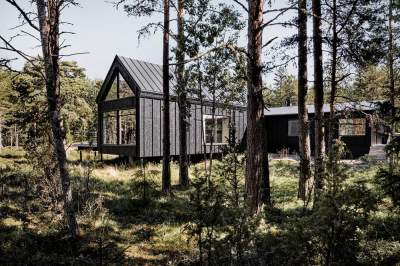 Этот летний домик оценят поклонники скандинавского стиля. Фото