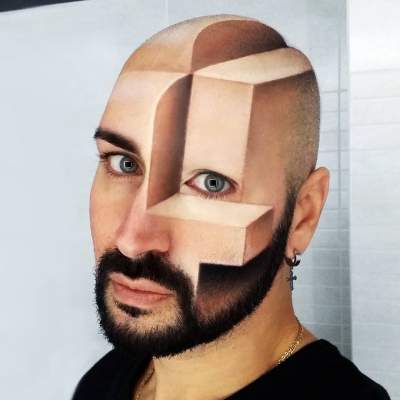  Художник создает 3D иллюзии прямо у себя на лице. Фото