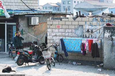 Как живется людям в трущобах Китая. Фото