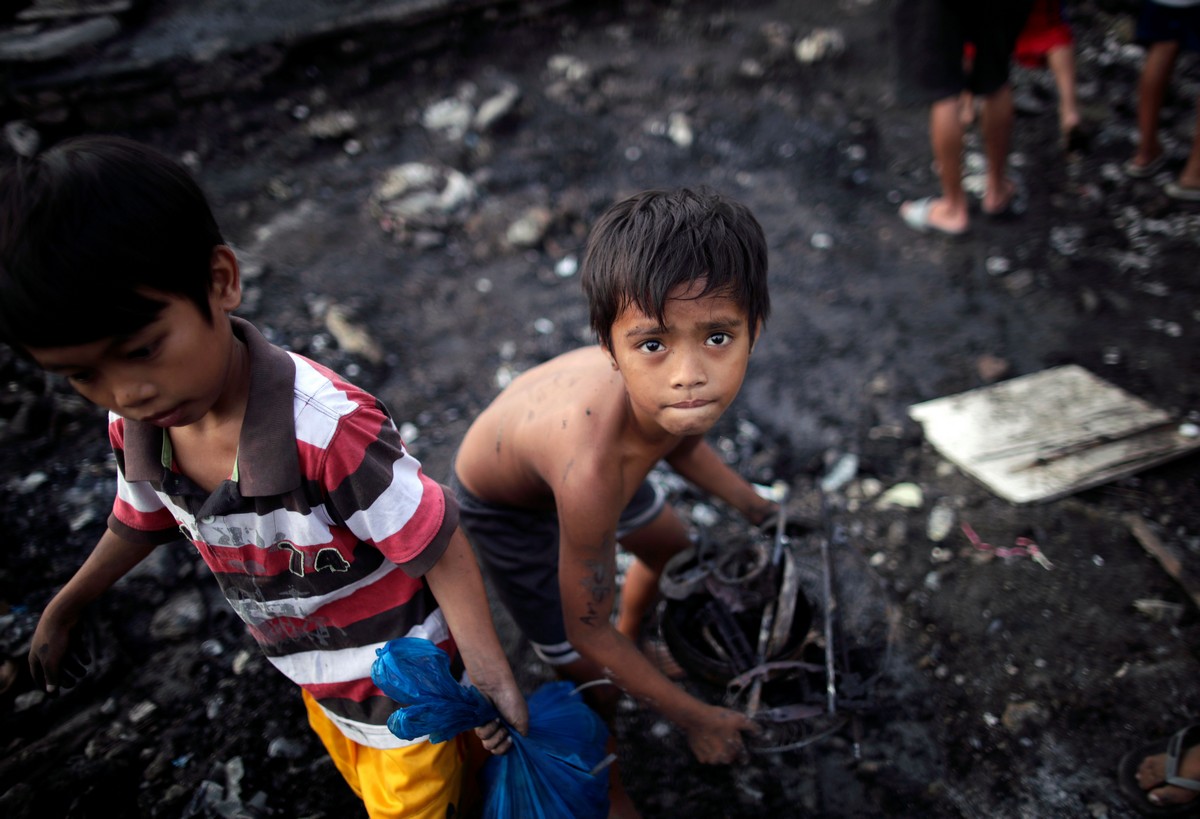 Жизнь в крупнейших трущобах Филиппин на снимках