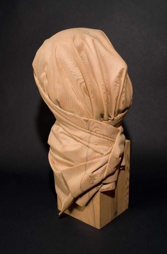 Умелые руки: невероятные скульптуры из дерева (Фото)