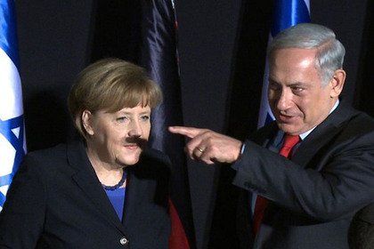 Нетаниягу случайно изобразил гитлеровские усы на лице Меркель