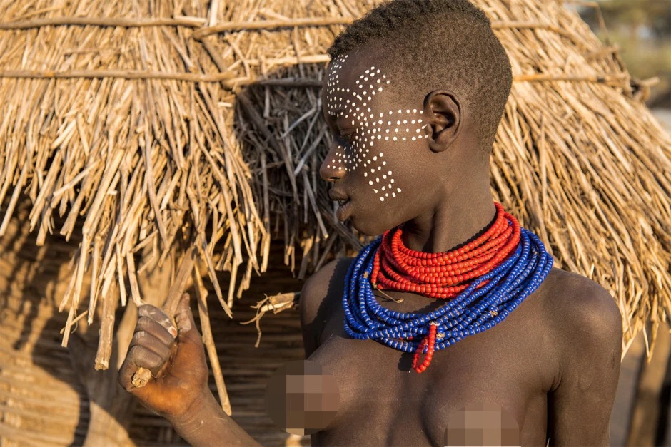  Боевой раскрас и дикие суеверия: удивительные фотографии племени каро. ФОТО