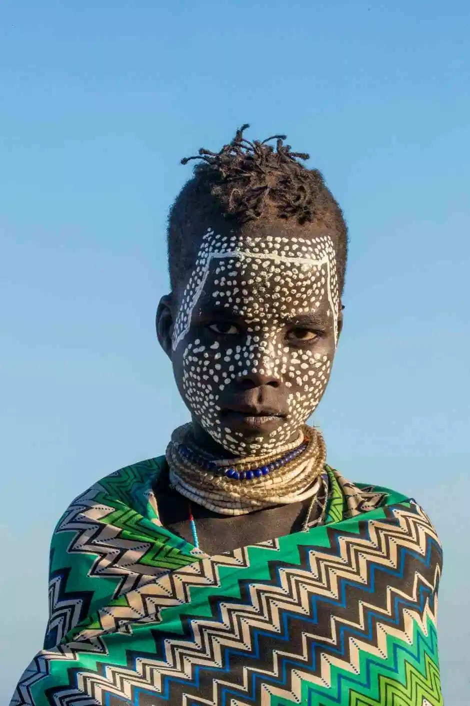  Боевой раскрас и дикие суеверия: удивительные фотографии племени каро. ФОТО